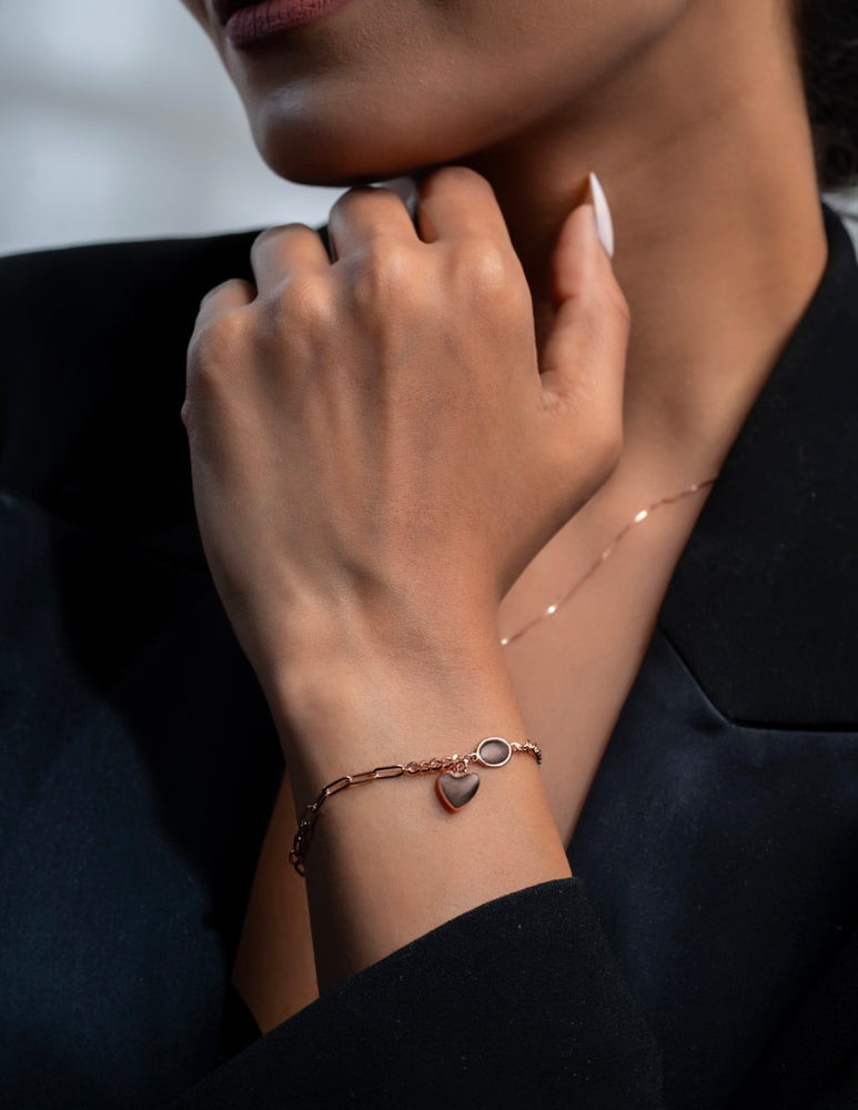 
                  
                    925 Sterling Silver bracelet plated in rose gold with romantic heart detail
                  
                