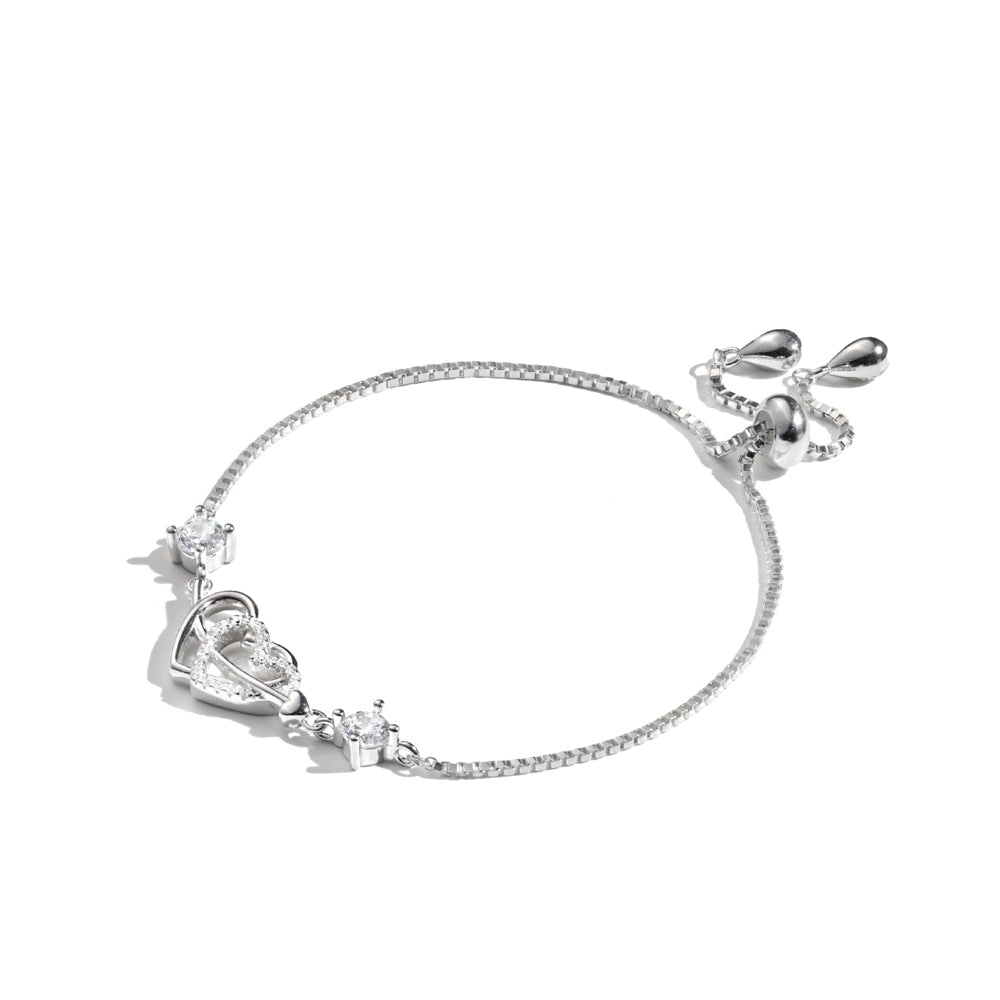 
                  
                    Elegant Klarity bracelet with twin hearts and rhodium-plated finish


                  
                