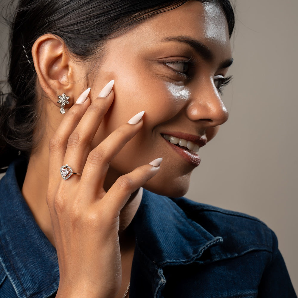 
                  
                    Sterling silver heart-shaped ring with radiant halo by Klarity
                  
                