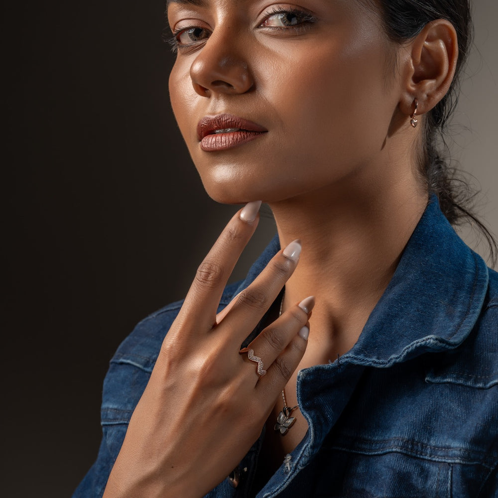 
                  
                    Klarity’s wave ring with textured sparkle—crafted for elegance and edge


                  
                
