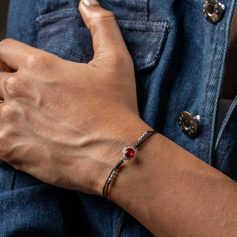 Striking red solitaire bracelet with 925 silver details – Klarity