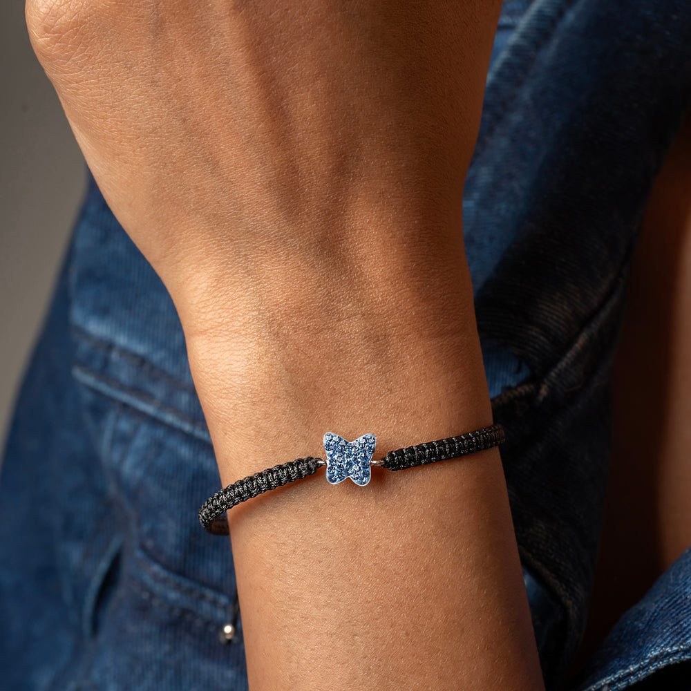 Sterling silver butterfly charm with blue CZ on adjustable cord – Klarity