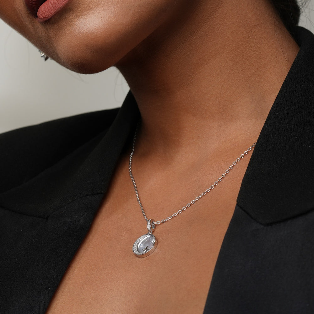 Styling Klarity’s moon & star pendant with layered boho jewelry