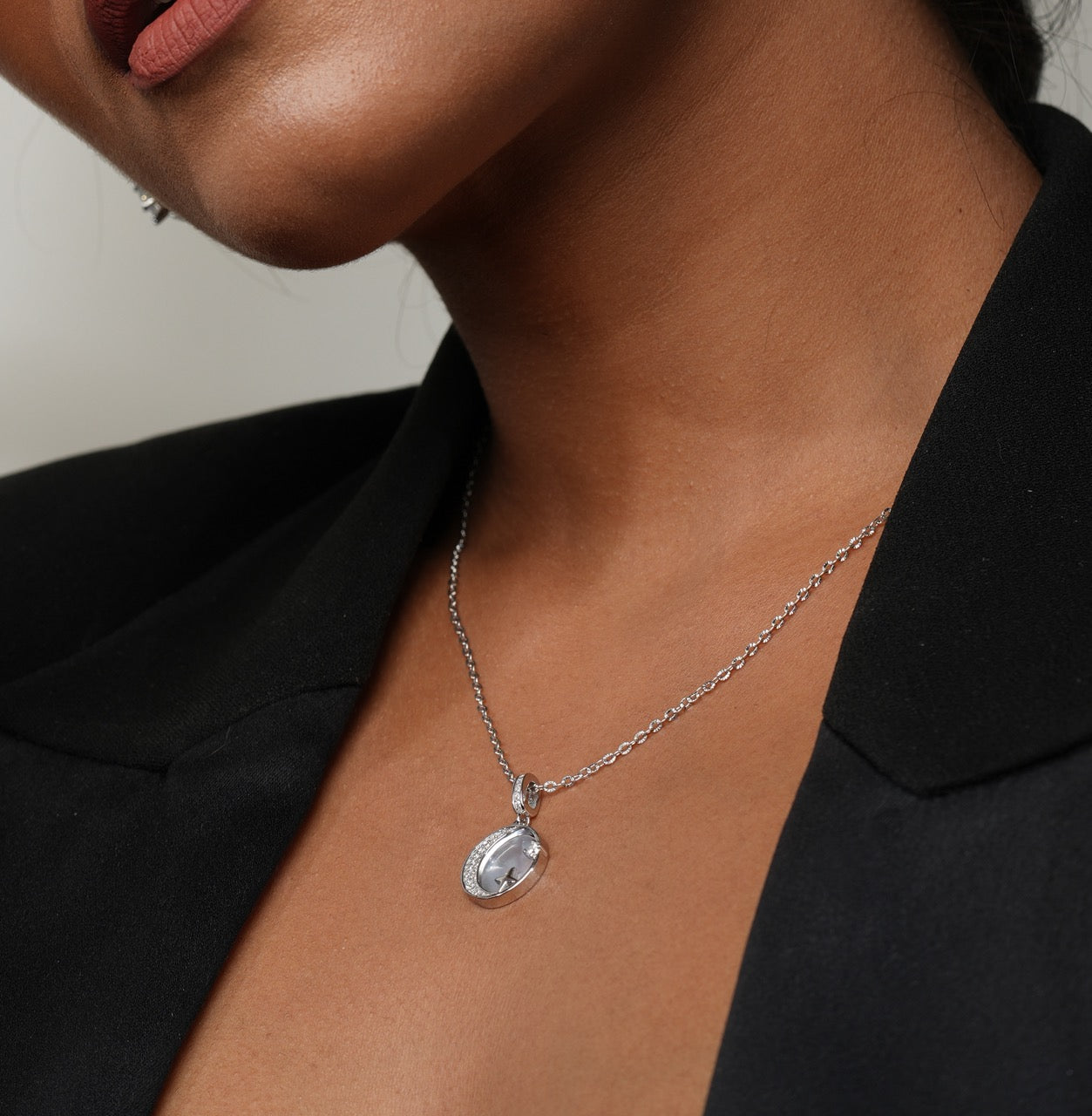 Styling Klarity’s moon & star pendant with layered boho jewelry
