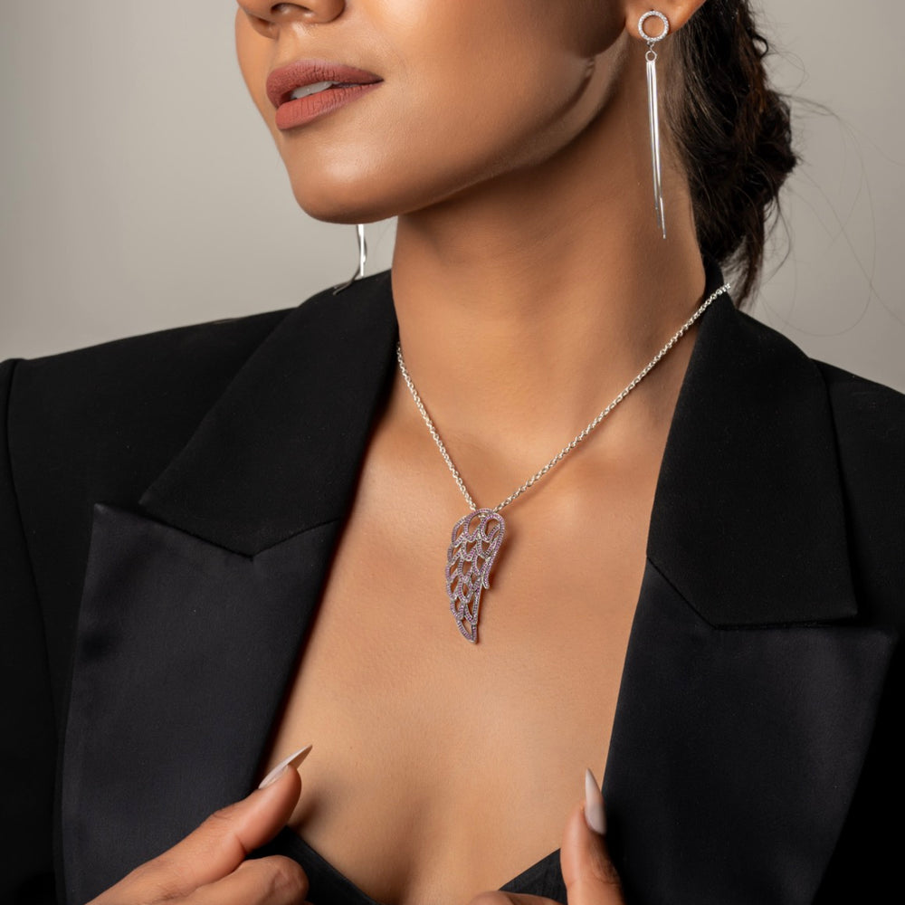 Elegant angel wing necklace by Klarity featuring red-toned accents