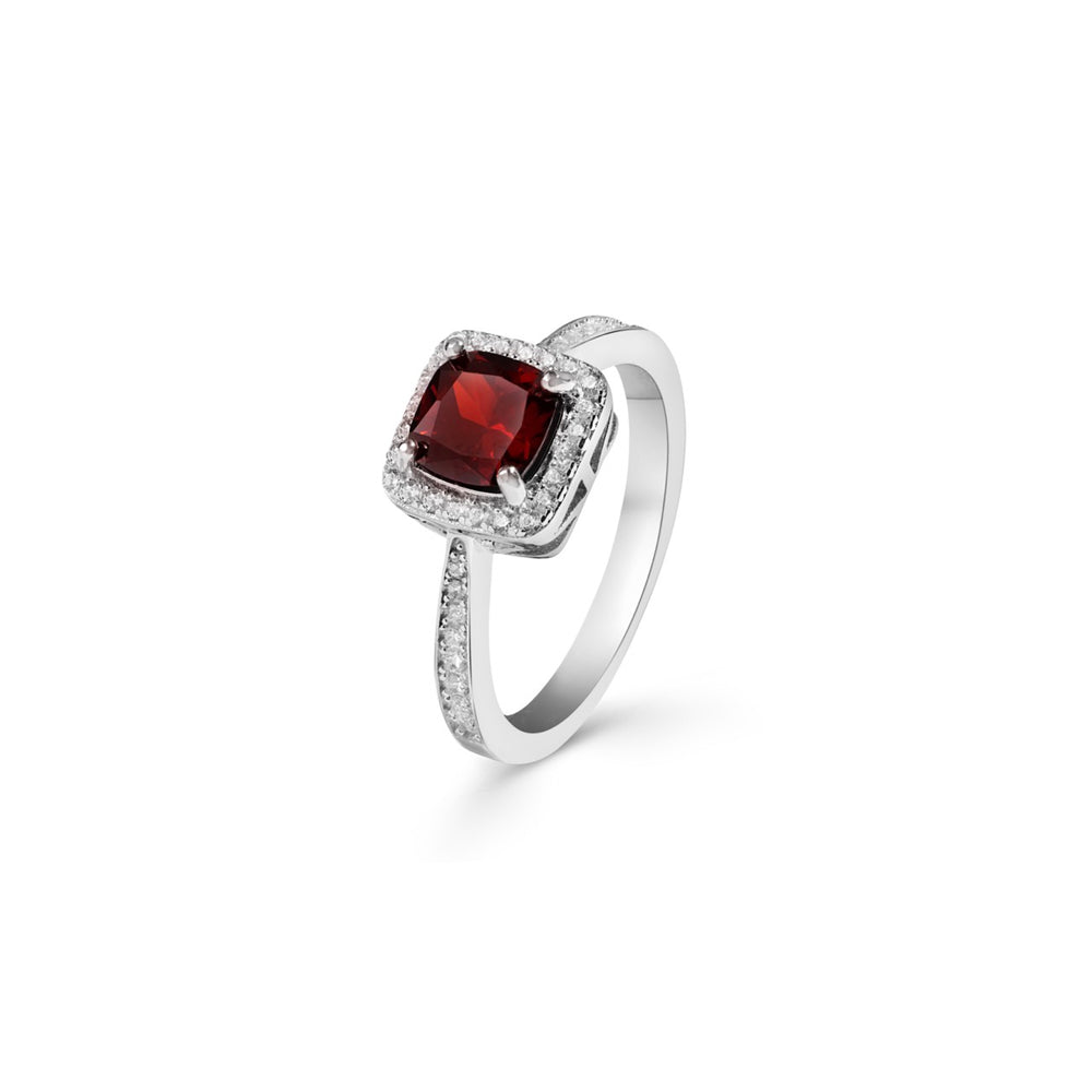 
                  
                    Klarity garnet red ring with intricate halo setting and radiant detail
                  
                