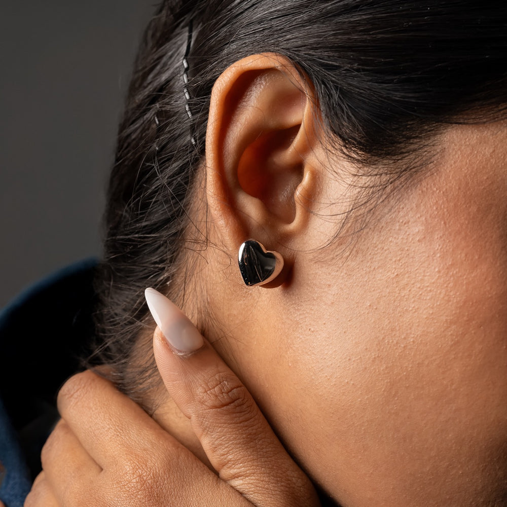 
                  
                    Klarity’s minimalist heart earrings with a touch of sparkle
                  
                