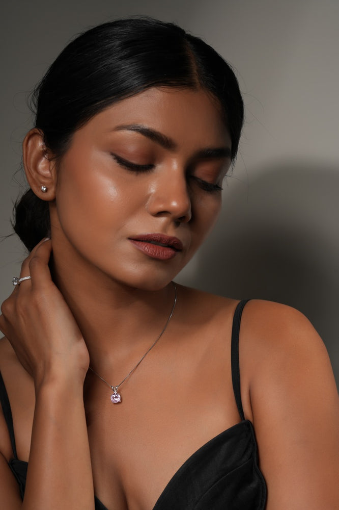 
                  
                    rhodium-plated solitaire pendant with brilliant round-cut sparkle
                  
                