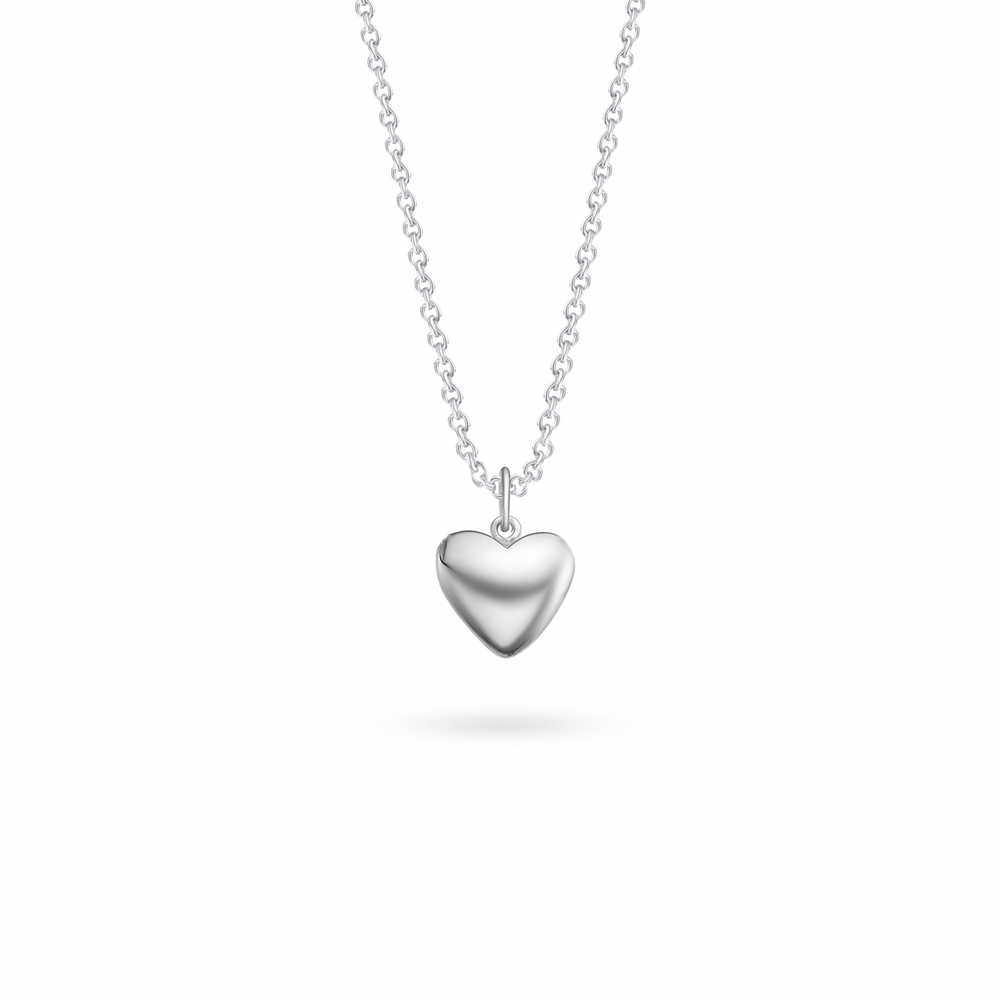 Minimalist silver heart pendant by Klarity—symbol of pure love and connection