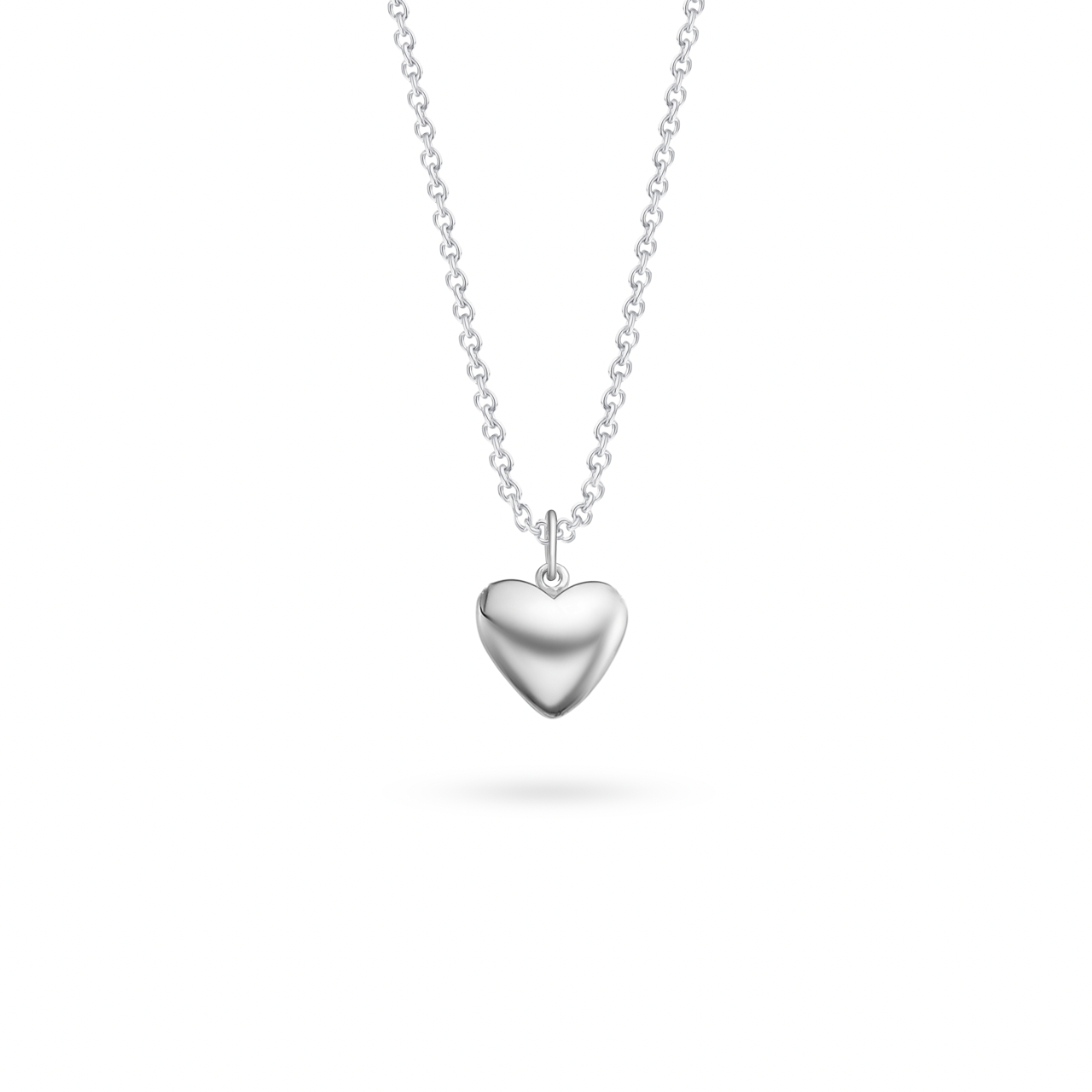 Minimalist silver heart pendant by Klarity—symbol of pure love and connection