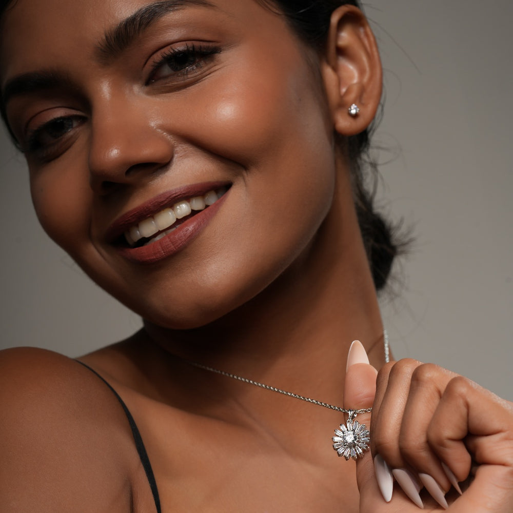 
                  
                    Elegant snowflake charm necklace crafted in sterling silver by Klarity
                  
                