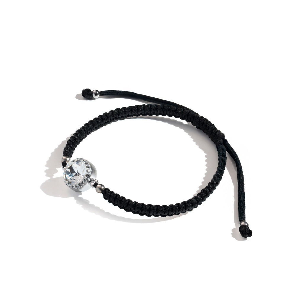 Klarity white solitaire bracelet with black braided cord and silver accents
