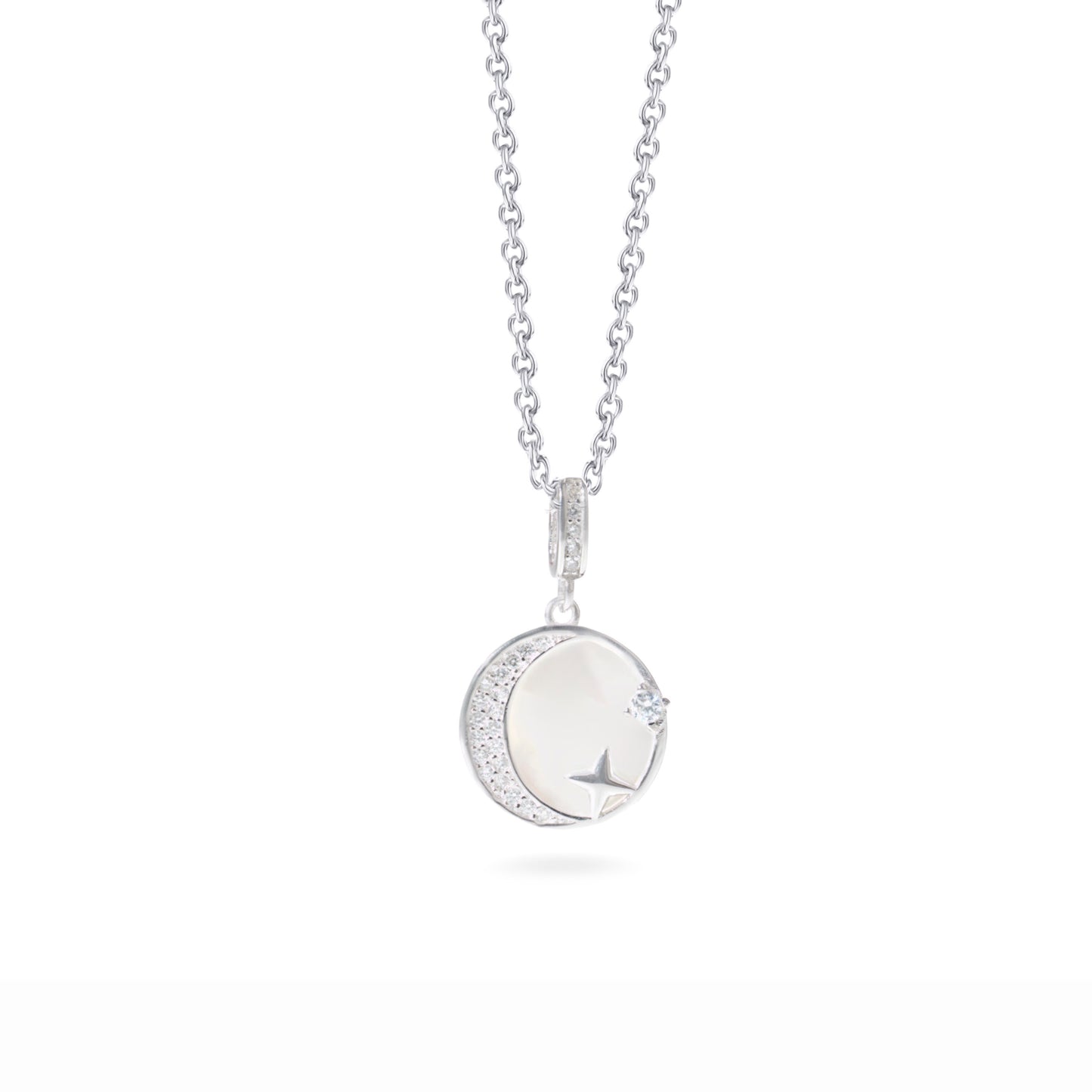 Klarity’s celestial pendant with CZ stars and mother of pearl moon on silver chain