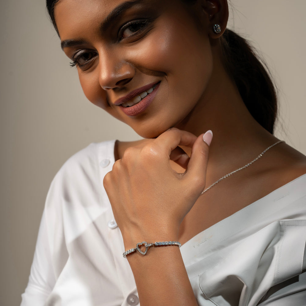 
                  
                    925 silver tennis bracelet with open-heart centerpiece – Klarity Collection
                  
                