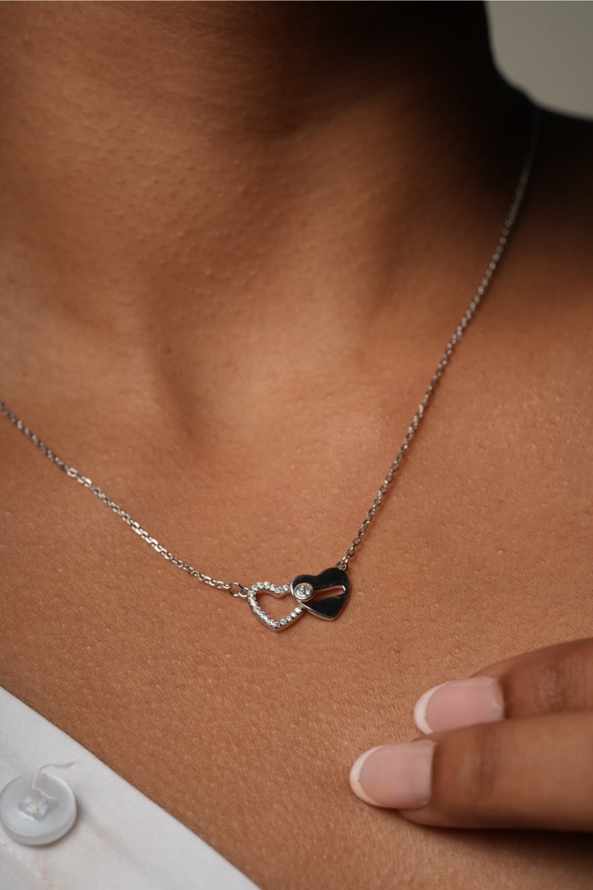 Contrast between Klarity’s polished heart and CZ-studded heart textures