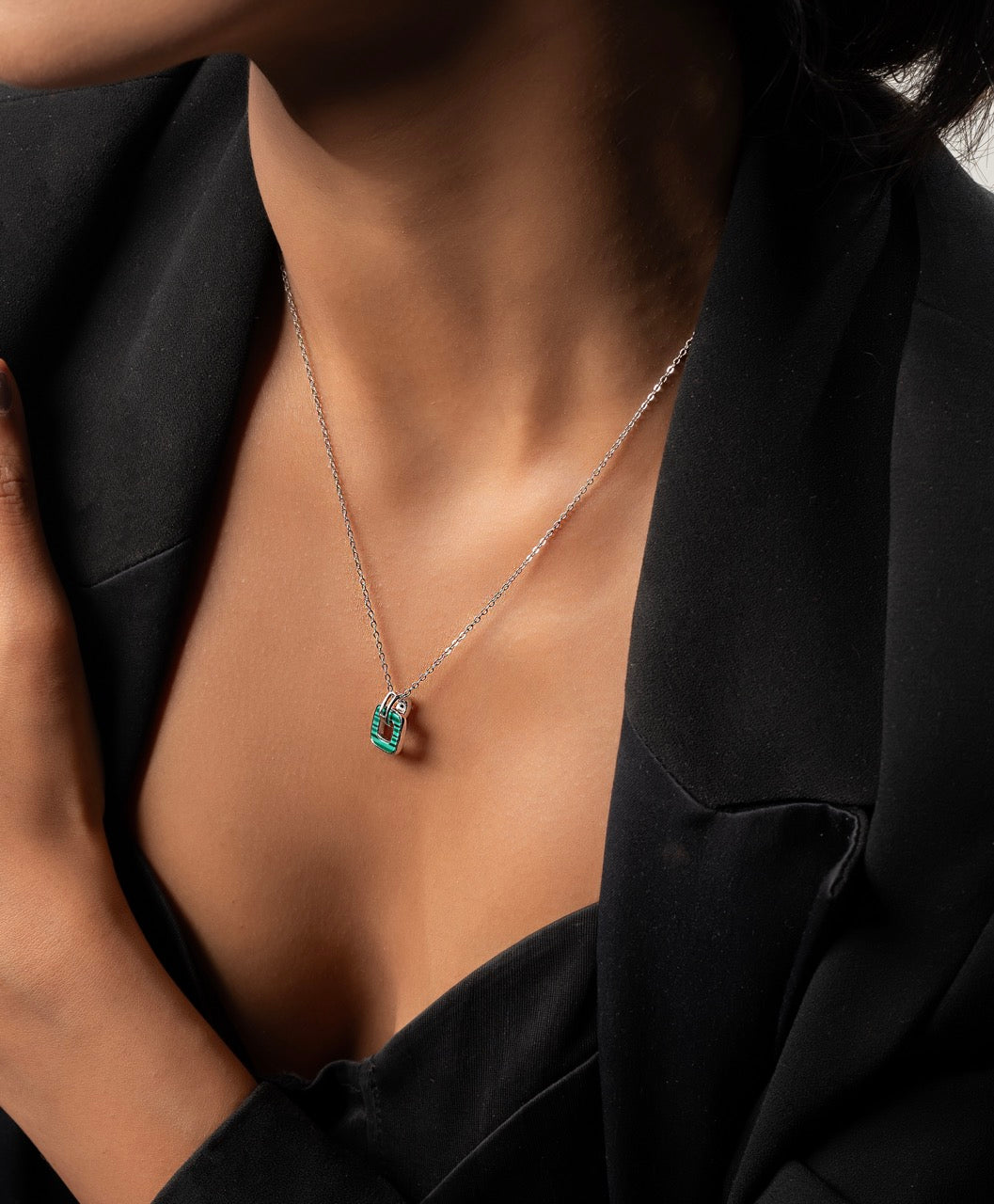 Styling Klarity’s green square pendant with blazer (day) and cocktail dress (night)