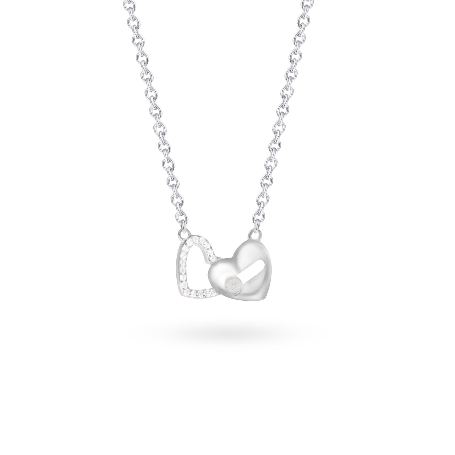 Klarity’s two hearts pendant - one polished, one CZ-studded - on silver chain