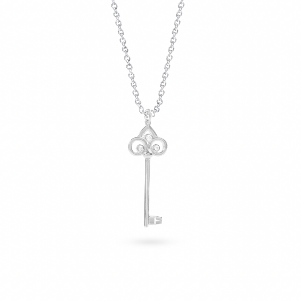 Vintage-style sterling silver key pendant necklace with intricate scrollwork details