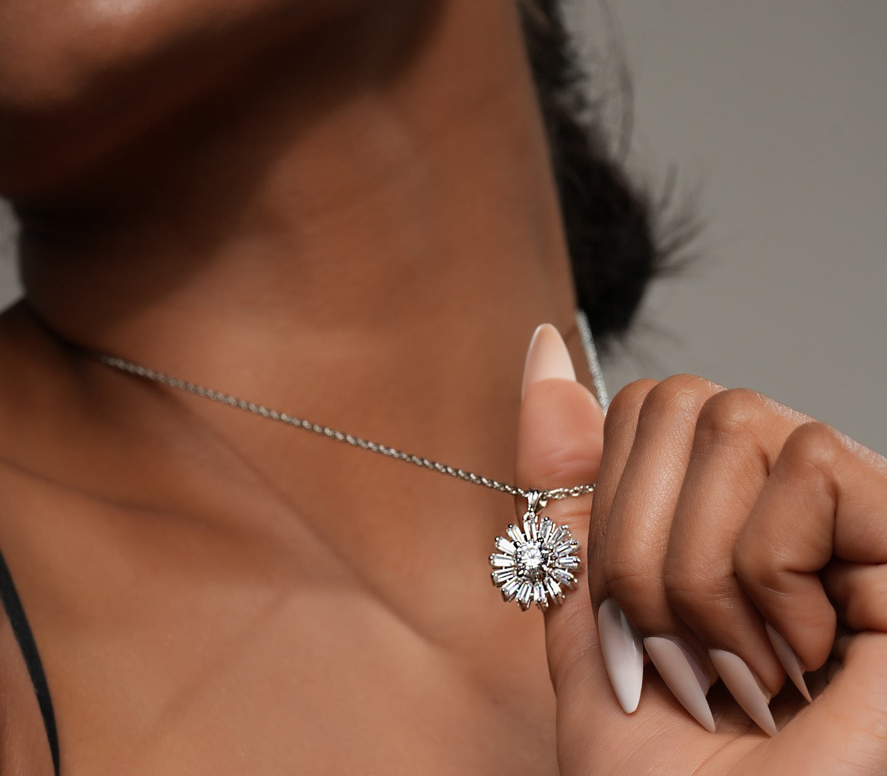 Winter-inspired snowflake pendant by Klarity with radiant stones